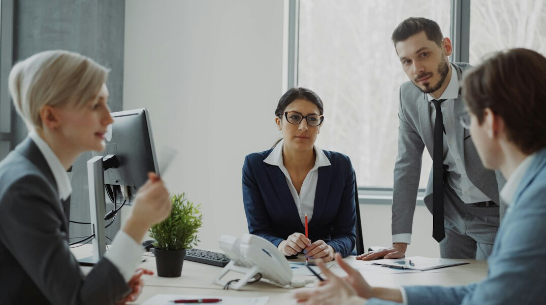 business team discussing technology